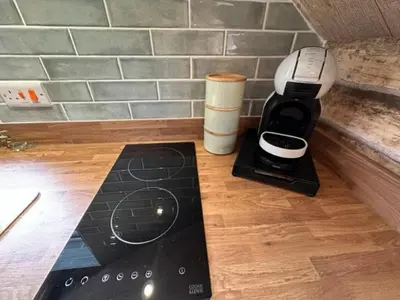 a coffee maker sitting on top of a counter at Squirrel Hideaway with Hot Tub in Formby, Liverpool in Formby
