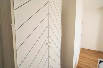 a sliding barn door in a living room at Majestic House Liverpool in Liverpool