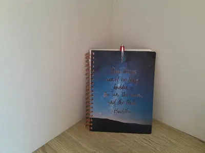 a notebook with writing on it on a wall at Ye Old'e Man - Sleeps 6 & Pet Friendly in Grange Over Sands