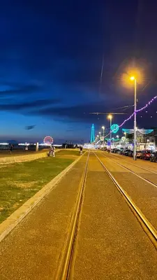a street with street lights on the side of a road at Double Room with Private Bathroom 16 Havelock Street - 6 in Blackpool