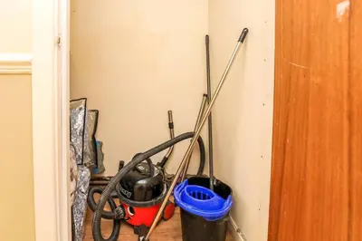 a room with some tools on the wall at Carlton Villa - Gorgeous detached home with parking in Liverpool
