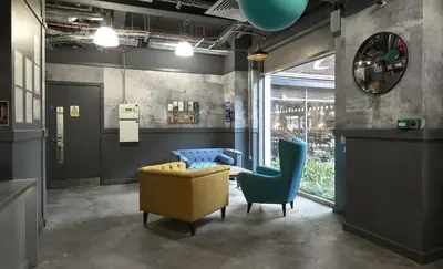a room with two chairs and a couch and a table at Liverpool Georgian Quarter in Liverpool