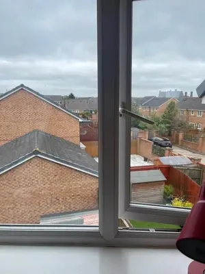 a window with a view of a building at Wavertree Accomodation in Liverpool