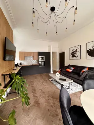 a living room with a couch and a table at No1,luxury 1 bed apartment in Saint Annes on the Sea