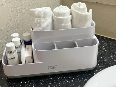 a container filled with towels and other products on a counter at Hare Meadow Lodge in Mellor