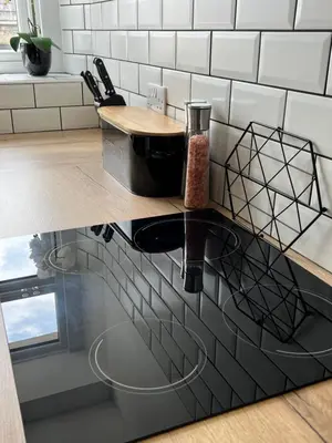 a kitchen with a counter with a sink and a counter at MOREaccom Maisonette in Morecambe