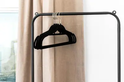 a black curtain hanger in front of a window at Anfield Four-Bed Spacious Getaway Haus in Liverpool