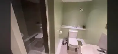 a bathroom with a toilet and a sink at 5 Halifax House, apartment 3 in Liverpool