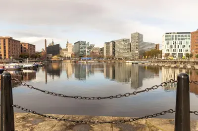 a view of a river with buildings and a city at No 45 Roscoe St in Liverpool