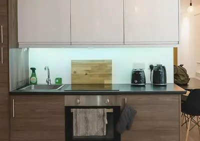 a kitchen with a sink and a counter top at Manhattan Suites Near Liverpool ONE sleeps 4 in Liverpool