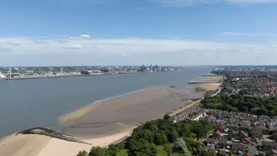 an aerial view of a beach and a city at Comfy 5 star Stays - 6 Bedrooms - Sleeps 8 - Free Parking & WiFi - Wirral in New Brighton