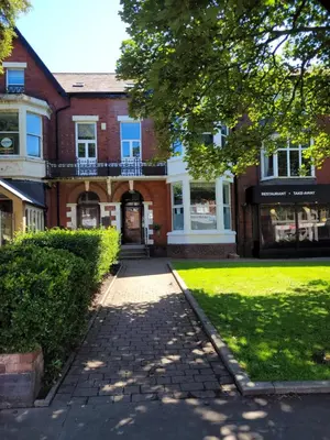a brick building with a walkway in front of it at Lytham St Annes Luxury Apartment - No 2 Tides Reach in Lytham St Annes