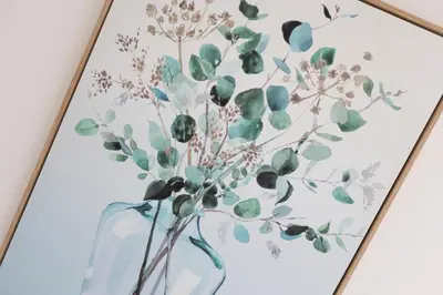 a painting of flowers in a blue vase at Lytham St Annes Luxury Apartment - No 2 Tides Reach in Lytham St Annes