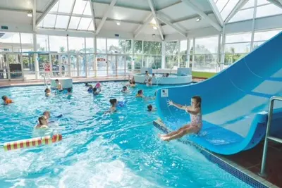 a group of people in a swimming pool at Haven, Cala Gran caravan park, privately owned in Blackpool
