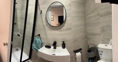 a bathroom with a sink and a mirror at Goldie's Retreat in Blackrod