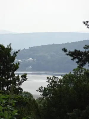 a view of a body of water with trees at Grange Manor in Grange Over Sands