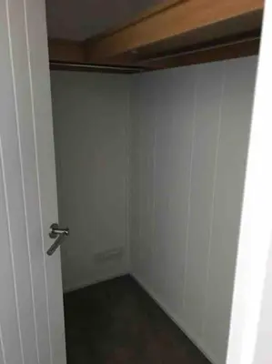 an empty room with a door and a wall at Driftwood Lodge - South Lakeland Leisure Village in Carnforth