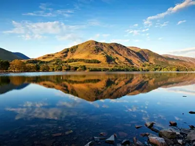 a mountain reflecting in the water of a lake at Uk46866 - Hawkshead in Ulverston