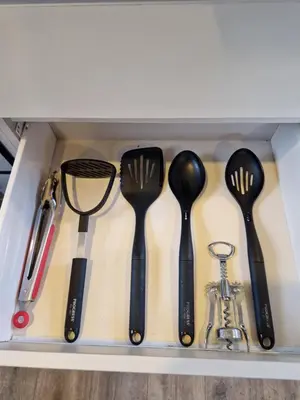 a drawer filled with forks and spoons and a tool at 8 Berth Caravan Haven Marton Mere in Blackpool