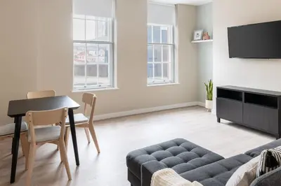 a living room with a table and a couch at Host & Stay - The Quarter in Liverpool