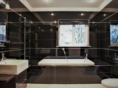 a bathroom with a tub and a sink and a window at The Farmhouse At Ream Hills in Weeton