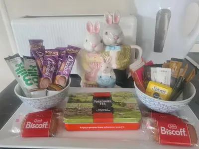 two rabbits are sitting in a refrigerator with other items at The Mayflower in Millom
