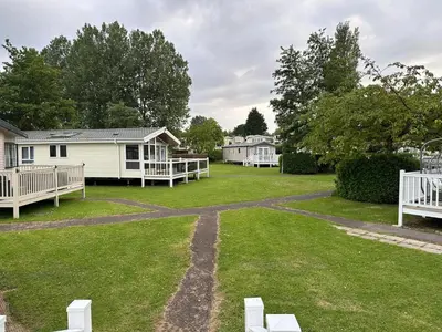 a view of a yard with houses in the background at Elite Retreat Blackpool in Blackpool