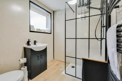 a bathroom with a sink and a shower at Ripon By Serene Stays Stylish Liverpool Home Sleeps 5 with Free Parking Fast WiFi and Close to Stadiums in Liverpool
