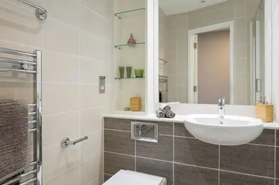 a bathroom with a sink and a mirror at Studio In Central Liverpool, Free Breakfast in Liverpool