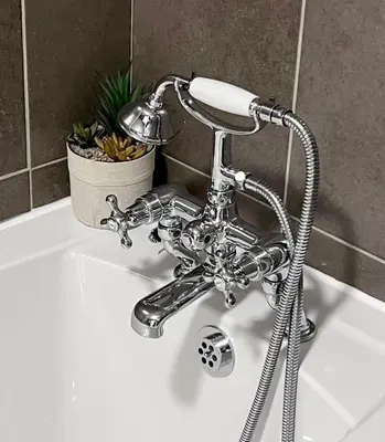 a bathroom sink with a faucet on a sink at Ropewalks City Centre Apartment with Roof Terrace in Liverpool