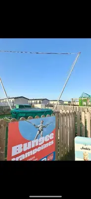 a sign on a fence with a sign on it at Seaside breaks morcambe in Heysham