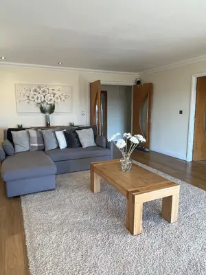 a living room with a couch and a coffee table at The View in Oswaldtwistle