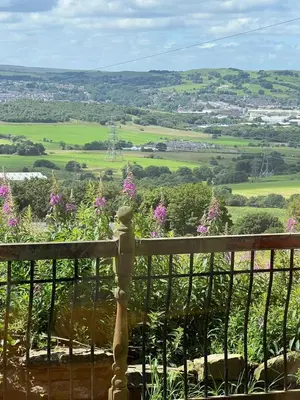 a view of the countryside from the balcony of a house at The View in Oswaldtwistle