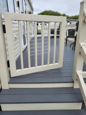 a porch with a white railing on a house at Angie stunning holiday home in Heysham