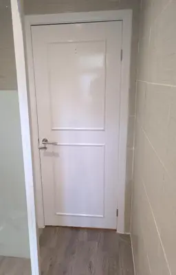 a white door in a bathroom with a shower at St Annes Lodge Garden Flat AWARD WINNING HOSTS in Lytham St Annes