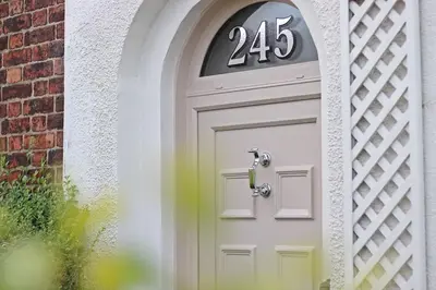 a white door with the number on it at Home in Chorley, Lancashire in Chorley