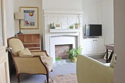 a living room with a fireplace and a tv at Home in Chorley, Lancashire in Chorley