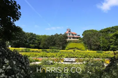 a house on top of a hill with a garden at Roundtree & Berry - Fleetwood in Fleetwood