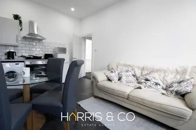 a living room with a couch and a table at Roundtree & Berry - Fleetwood in Fleetwood