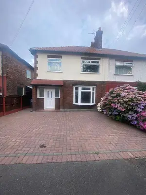 a brick driveway in front of a house at Lovely 3 bed house in Crosby in Crosby
