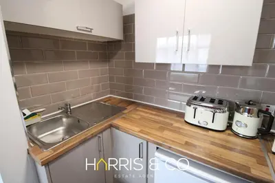 a kitchen with a sink and a counter top at Phoenix Rise in Fleetwood