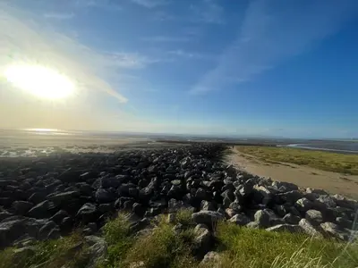 a large group of rocks on a beach at Bay Wind Apartment in Morecambe