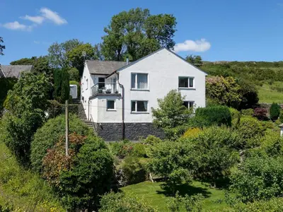an aerial view of a house with a garden at Beautiful Detached Property Hot Tub Sauna - Pass the Keys in Lake Side