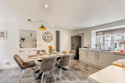 a kitchen and dining room with a table and chairs at 3 Bed in Newton In Cartmel oc-a29796 in High Newton