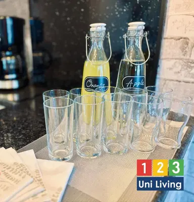 a group of empty wine glasses sitting on a table at Leatham Park Hotel Blackpool in Blackpool