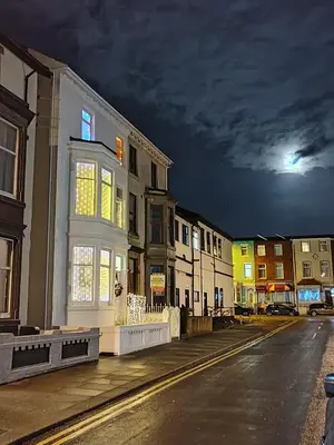 a city street at night with a building at Double Room with Private Bathroom Partial Tower view 16 Havelock Street - 5 in Blackpool