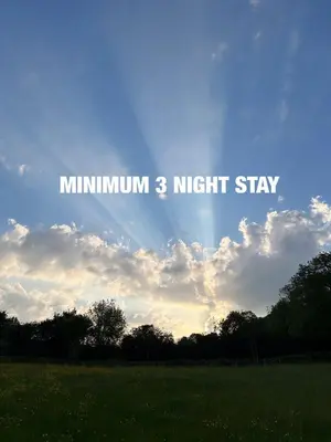 a cloudy sky with the words minium night stay at Millbrook by the sea in Wallasey