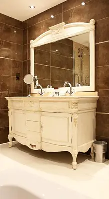 a bathroom with a sink and a mirror at DoubleTree by Hilton Hotel & Spa Liverpool in Liverpool