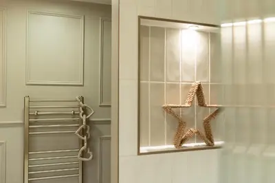 a glass door with a star decoration in a bathroom at Heather room at field view cottage in Eccleston