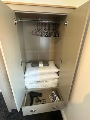 a small closet with two beds in it at New Luxury apartment, sea viewWith parking in Blackpool